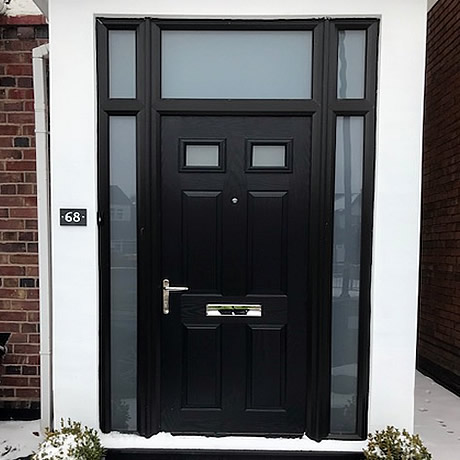 Grand entrance with composite door finished in classic black fished with acid-etched glazing installed in Southam Road, Hall Green, Birmingham by Solihull WDC, www.solihullwindows.co.uk