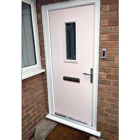 www.solihullwindows.co.uk displaying a subtle pink composite door with white frame