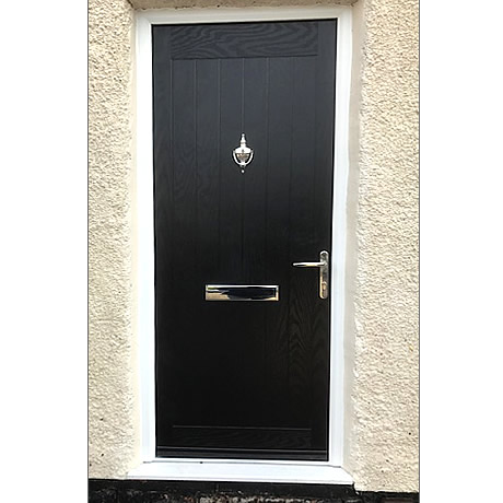solid composite door finished in black installed in solihull by Solihull WDC, www.solihullwindows.co.uk